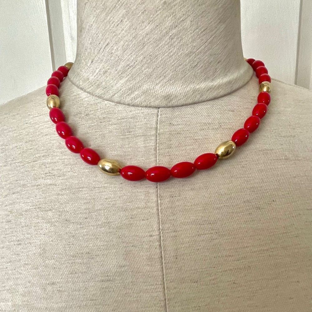 Red and gold tone beaded necklace